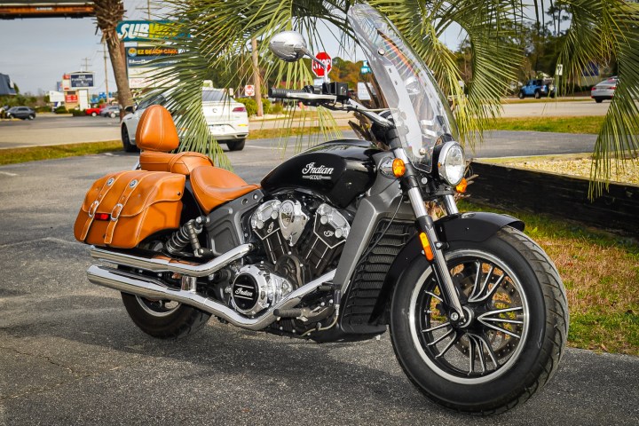 a motorcycle parked on the side of a road